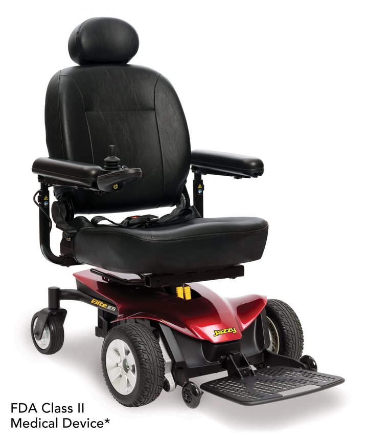 A red power wheelchair with a high-back seat, seen from the side.